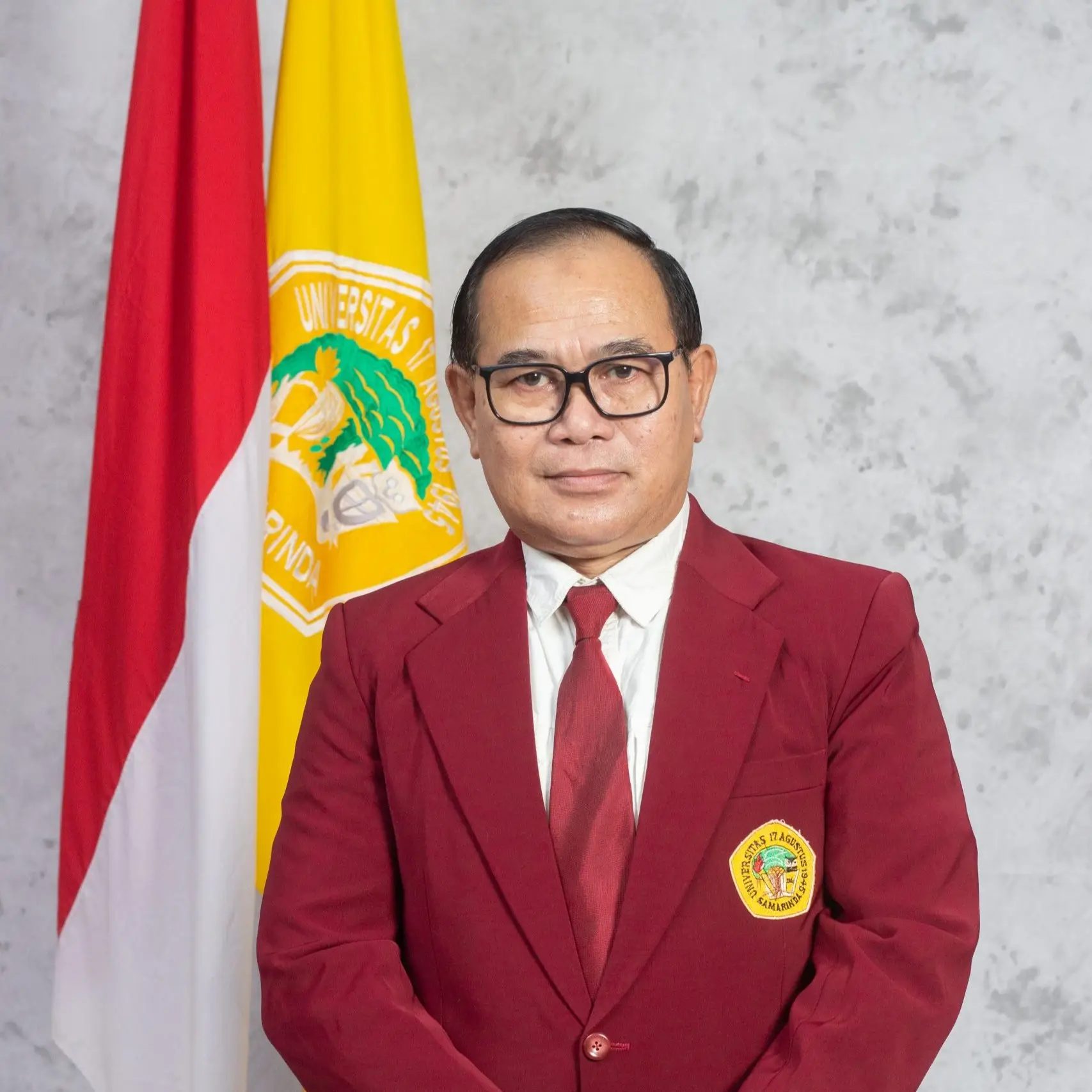 Dr. Marjoni Rahman, M.Si.